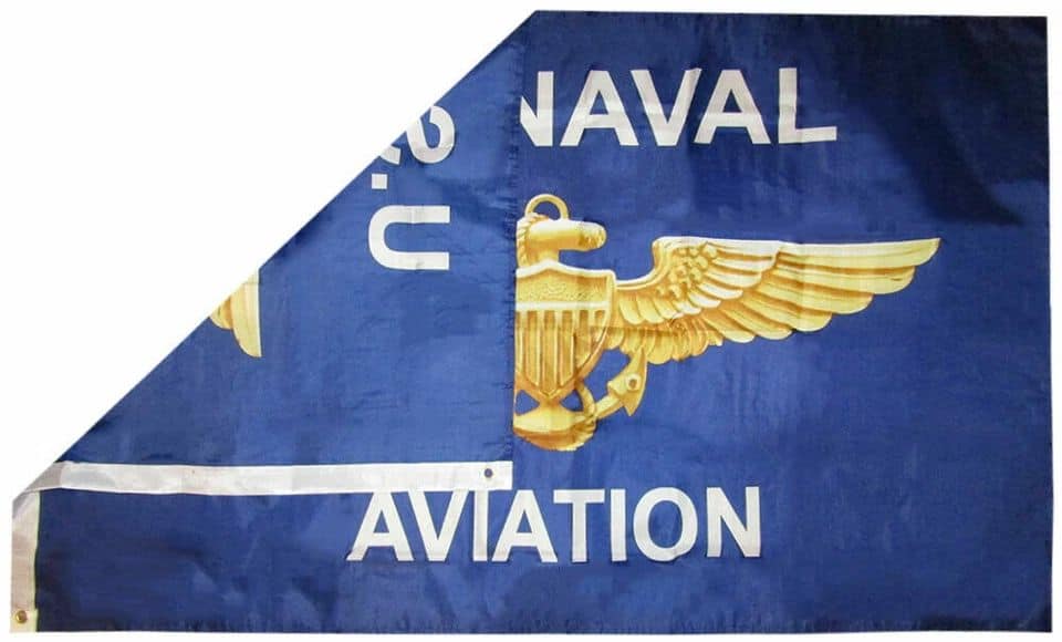U.S. Navy Naval Aviation flag featuring a golden eagle with outstretched wings holding a shield, set against a blue background with white text.
